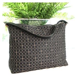 Kate Spade Dot Noel bag with pink interior.